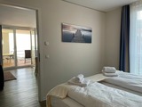 Ferienwohnung in Eckernförde - Apartmenthaus Hafenspitze Ap. 16 "Seetaucher", Blickrichtung Strand/Offenes Meer - Bild 17