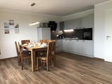 Ferienhaus in Fehmarn OT Gammendorf - Feriendomizil SeeSand 2 - Küche mit Essbereich Ferienhaus in Fehmarn OT Gammendorf - Feriendomizil SeeSand 2 - Küche mit Essbereich